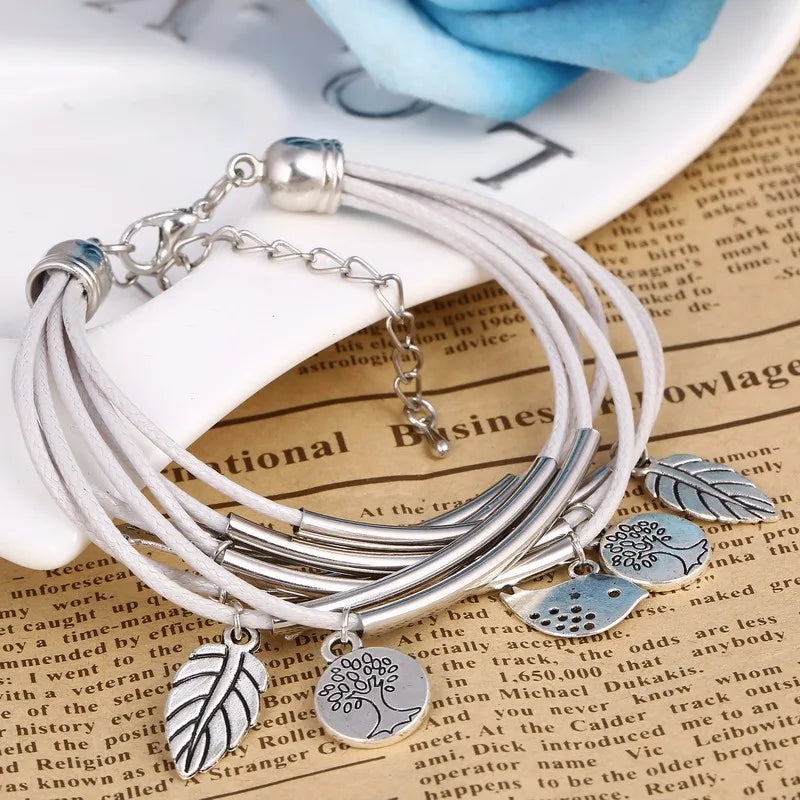 Stylish women's gray layered multi-strand leather bracelet, featuring a secure magnetic clasp.