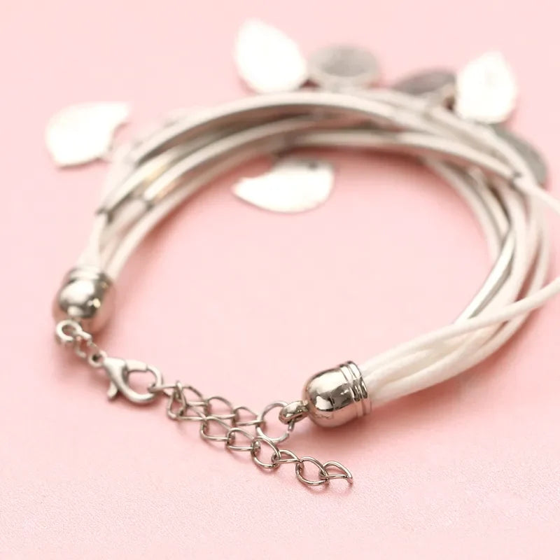 Women's layered gray leather bracelet, a multi-strand design & fashionable accessory, ideal gift.