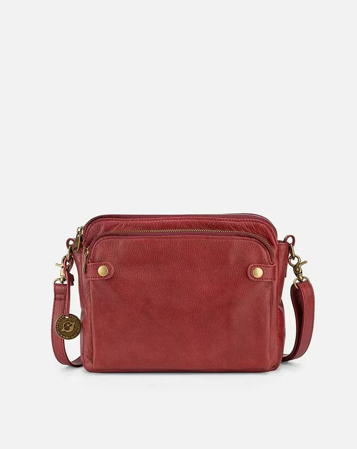 Chic women's leather crossbody handbag, a must-have fashion accessory.