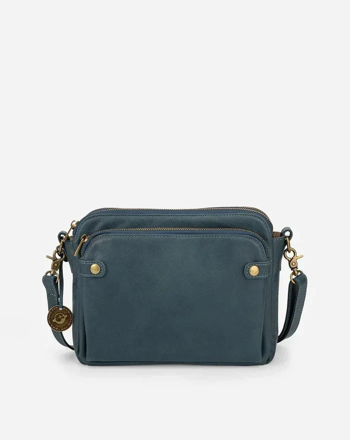 Classic women's leather crossbody shoulder bag, adds elegance to any outfit.