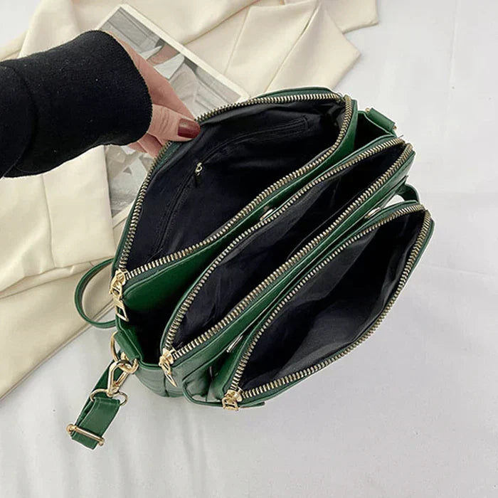 Elegant women's leather handbag, a sleek crossbody shoulder bag designed for style & comfort.