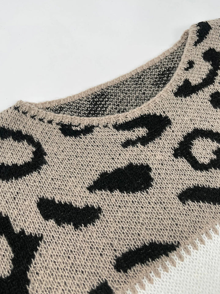 Cozy women's leopard print sweater, soft jumper perfect for stylish winter & autumn wear. Chic animal print.