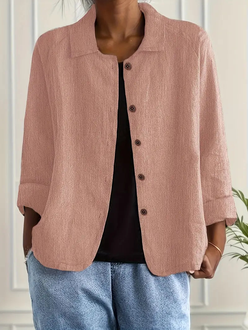 Flowy women's lightweight shirt cardigan, offering comfort and style for warm weather layering.