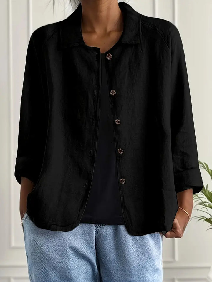 Close-up of lightweight fabric on women's shirt cardigan, showcasing comfort and summer style.