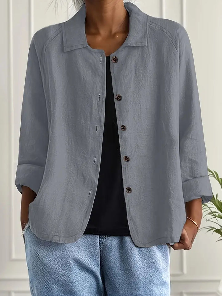 Side view of a woman in a stylish lightweight shirt cardigan, ideal for versatile spring fashion.