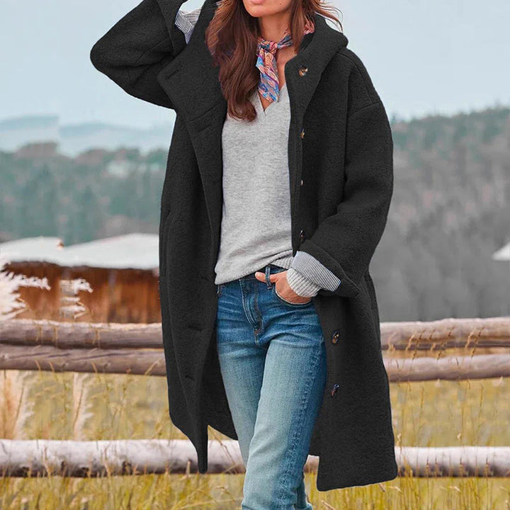 Fashionable women's long hooded coat, a versatile casual jacket for everyday wear.