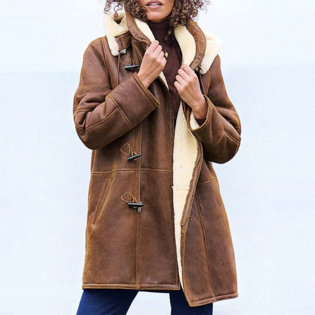 Stylish women's long lightweight puffer jacket for winter warmth. Perfect casual active wear for cold weather.