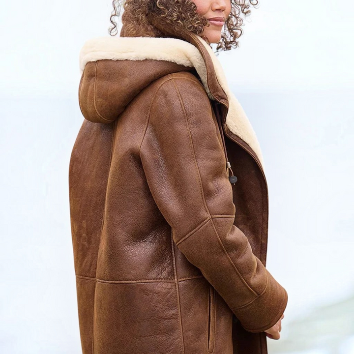 Warm women's long hooded puffer jacket, ideal lightweight winter coat for fall fashion and cold weather.