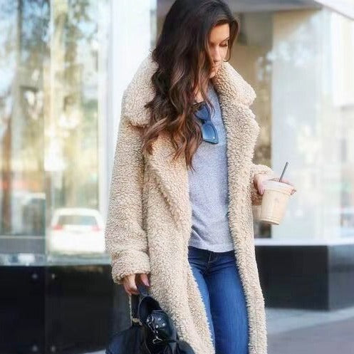 Stylish women's long teddy coat, warm & cozy winter fashion, perfect trendy outerwear.