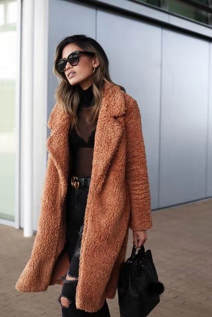 Comfy long teddy coat for women, a trendy & warm winter jacket, stylish outerwear for cold days.