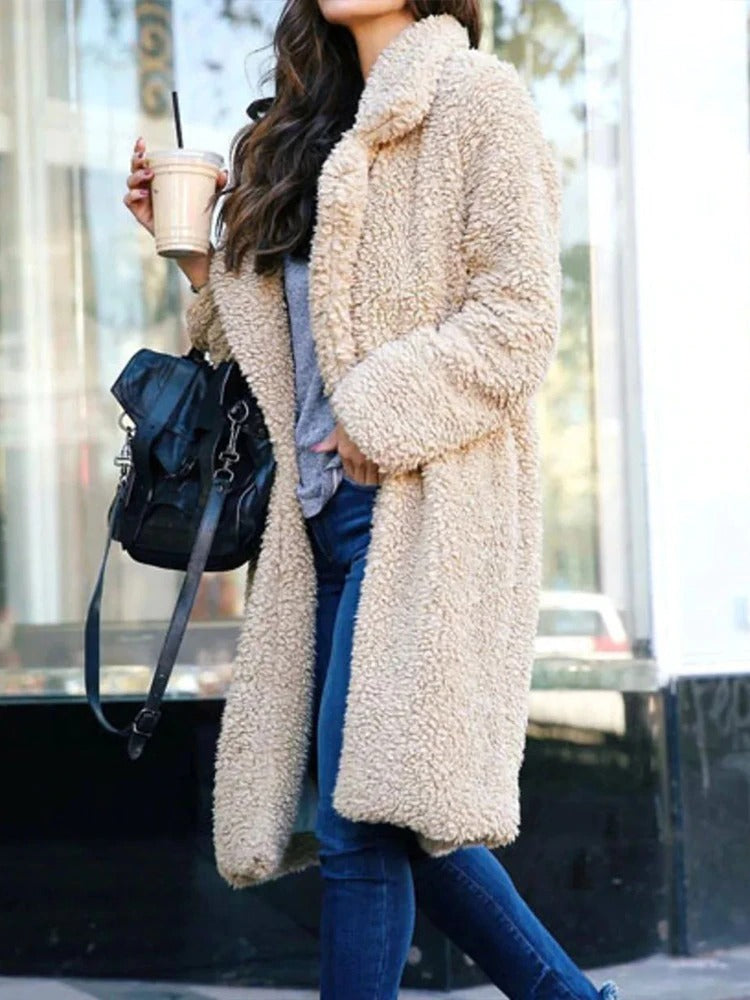 Warm women's long teddy coat, oversized fit for ultimate comfort, stylish winter fashion essential.