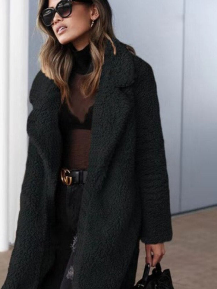 Trendy women's long teddy coat, soft texture, a cozy jacket for cold weather & stylish outerwear.