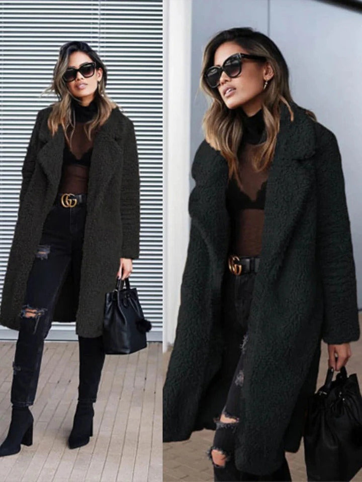 Fashionable women's long teddy coat, warm & comfy, perfect for winter fashion and stylish outings.