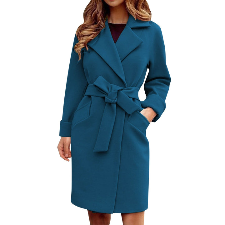 Woman in a fashionable long trench coat. Warm winter jacket, elegant women's outerwear & stylish fashion.