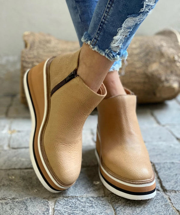 Comfortable women's low ankle boots, ideal everyday footwear for stylish fall & winter fashion.