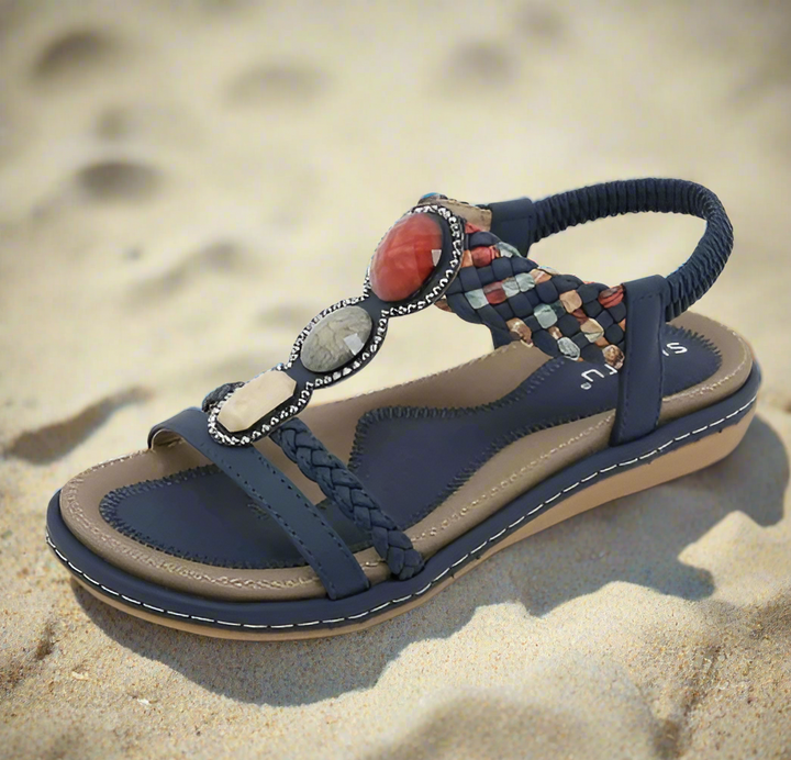 Elegant open toe women's low sandals, offering ergonomic comfort for stylish daily wear & summer activities.