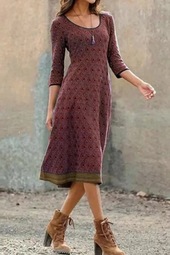 Livia women's printed midi dress with half sleeves, ideal for summer vacation wear & plus size fashion. Casual elegant.