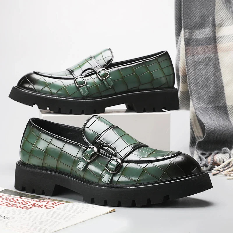 Comfortable black platform loafers for women, featuring a slip-on design & embossed details.