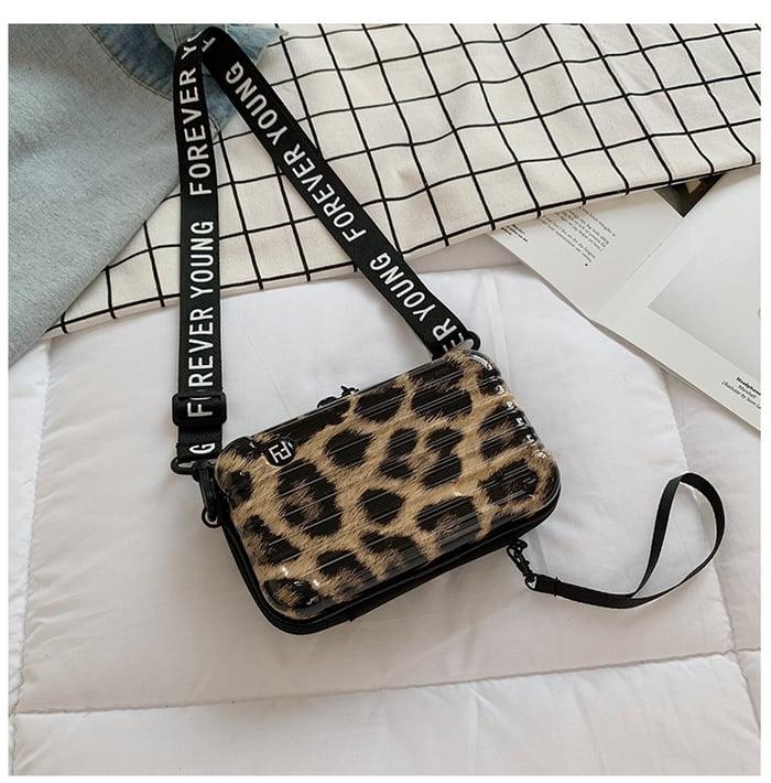 Chic women's mini travel bag, a compact & functional polyester accessory for modern daily life.