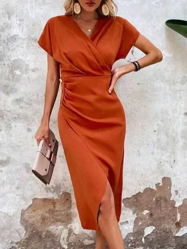 Elegant orange V-neck midi dress for women, ideal for sophisticated events or a vibrant everyday outfit.