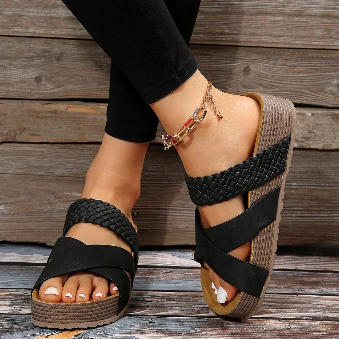 Comfortable slip-on women's sandals with orthopaedic support. Versatile low-heel footwear for stylish summer walking.