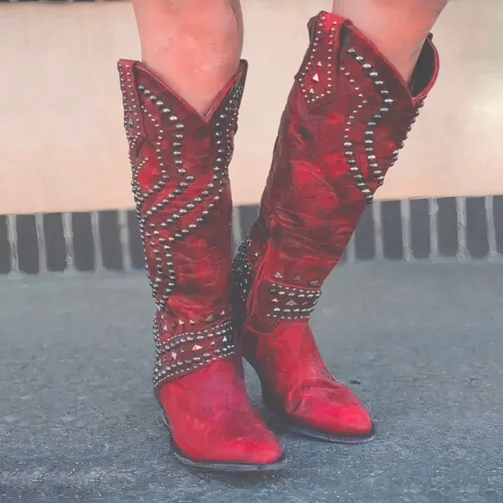 Comfortable women's orthopedic knee-high boots featuring a supportive mid-block heel & sleek design.