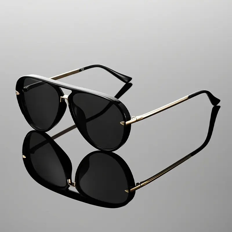 Chic women's oversized aviator sunglasses, a must-have fashion accessory for summer UV protection.