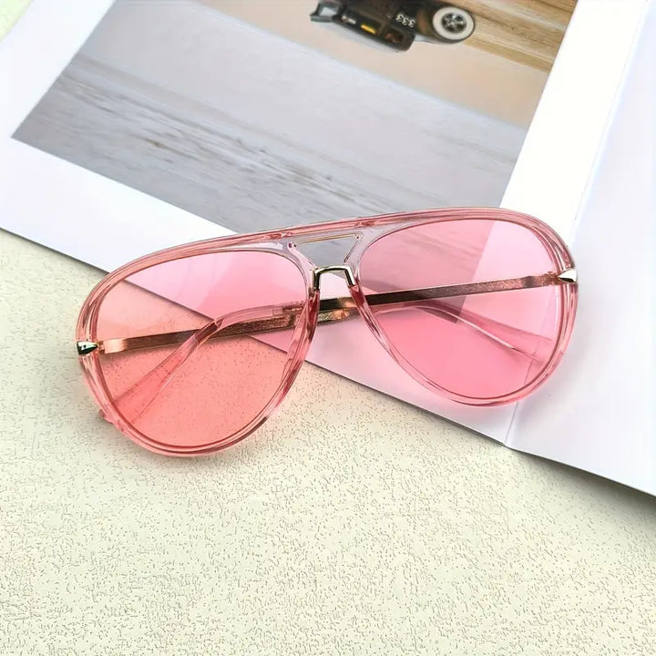 Elegant women's oversized aviator sunglasses. Essential stylish eyewear accessory for UV protection.