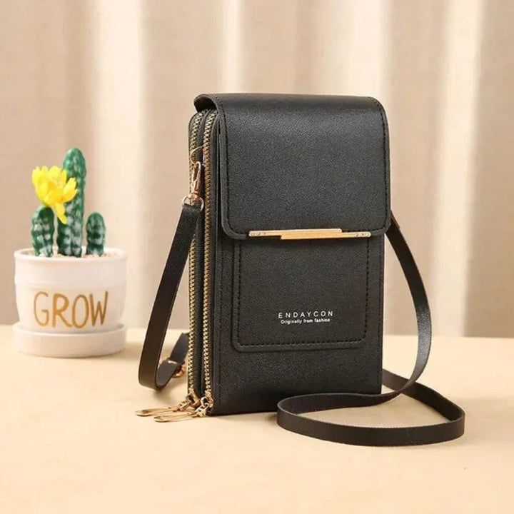 Stylish women's phone crossbody bag with clear touchscreen pocket for hands-free access. Perfect everyday accessory.