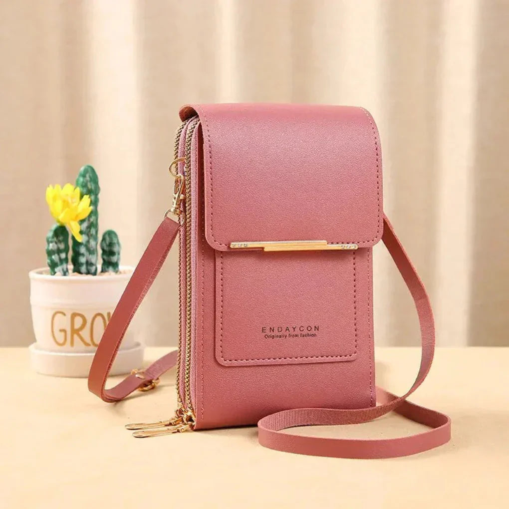 Compact black touchscreen phone crossbody bag for women. Keep your smartphone safe & accessible on the go.