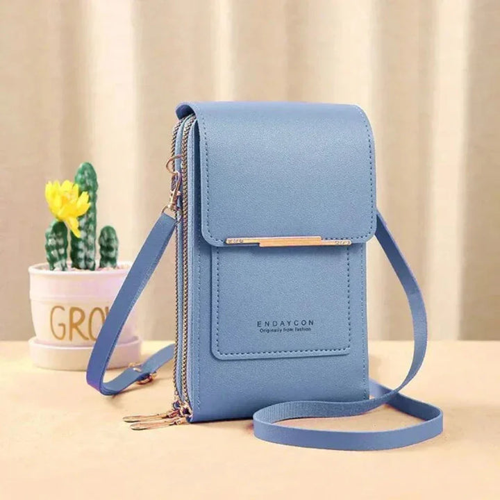 Sleek women's phone crossbody purse with a responsive touchscreen window. Keep essentials organized & close.