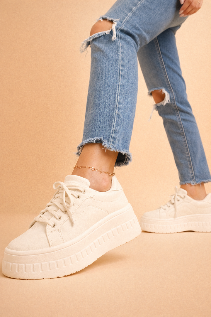 Fashionable women's platform sneakers, clean design with chunky sole. Cushioned & stylish casual footwear.