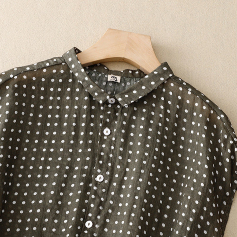 Chic women's polka dot short sleeve top. This casual yet elegant blouse is perfect for summer fashion outfits.