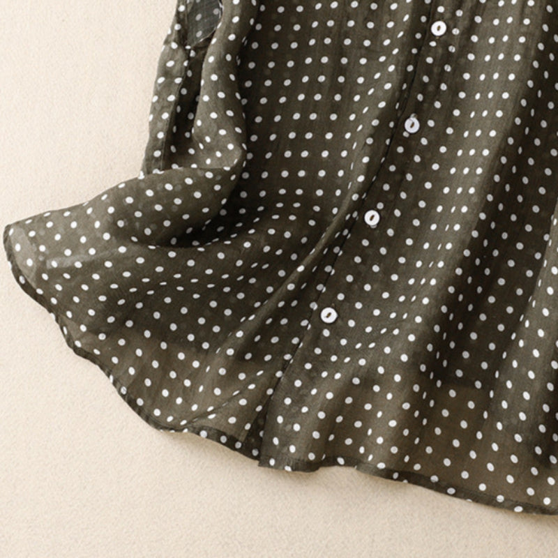 Versatile women's short sleeve polka dot top. Comfortable and stylish, ideal for summer casual or dressy looks.