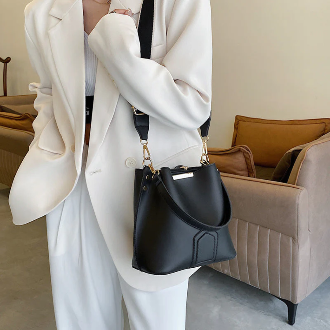 Fashionable white premium leather shoulder bag for women, a stylish and versatile daily handbag.