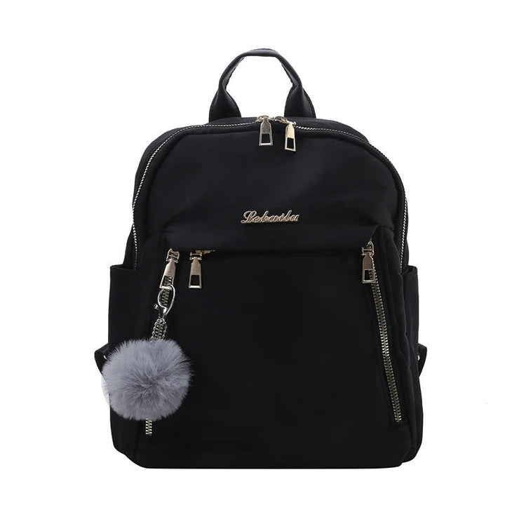 Open women's PU leather travel backpack revealing organized storage pockets for essentials & gadgets.