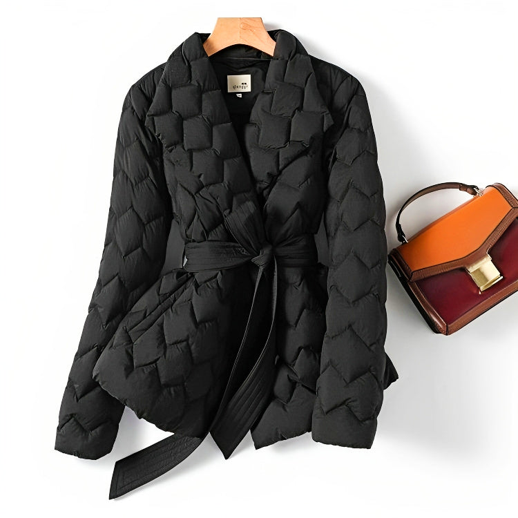 Comfortable women's quilted puffer coat, a chic winter jacket perfect for cold weather warmth and style.