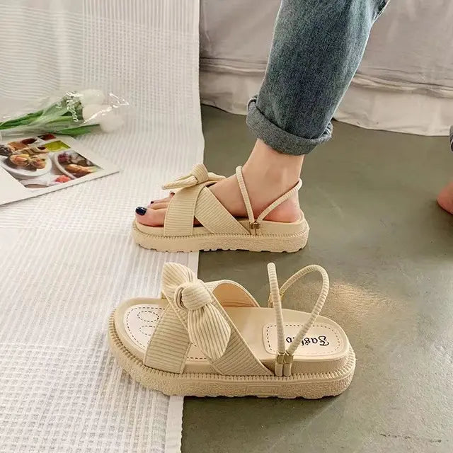 Sienna espadrille sandals with elegant wrap straps. Comfortable and chic women's footwear for summer and beach.