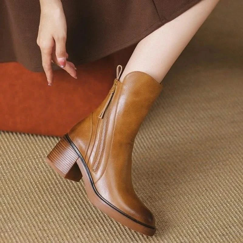 Fashionable women's Sloane high-heel ankle boots with a sleek design, enhancing any contemporary outfit.