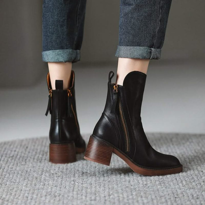 Sophisticated women's Sloane high-heel ankle boots, offering a secure fit and timeless style.