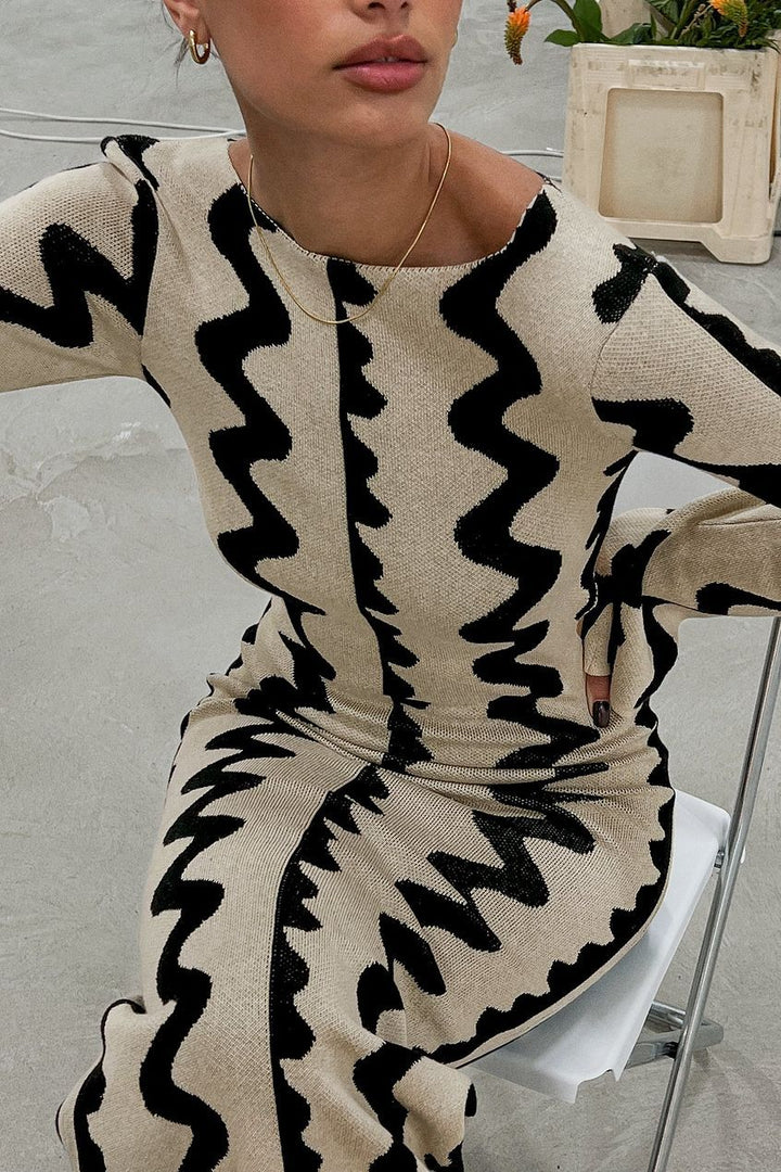 Versatile women's summer midi dress featuring an elegant wave pattern, ideal for day to evening wear.