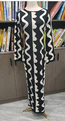 Elegant summer midi dress for women, showcasing a beautiful wave pattern. A stylish choice for casual or chic events.