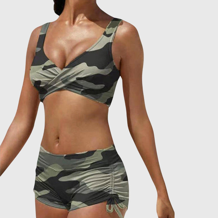 Stylish women's two-piece bikini set, perfect for beach & pool swimwear. Flattering fit for summer vacation.