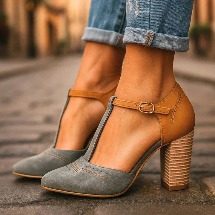 Stylish women's two-tone block heel pumps for comfortable all-day wear & versatile fashion.