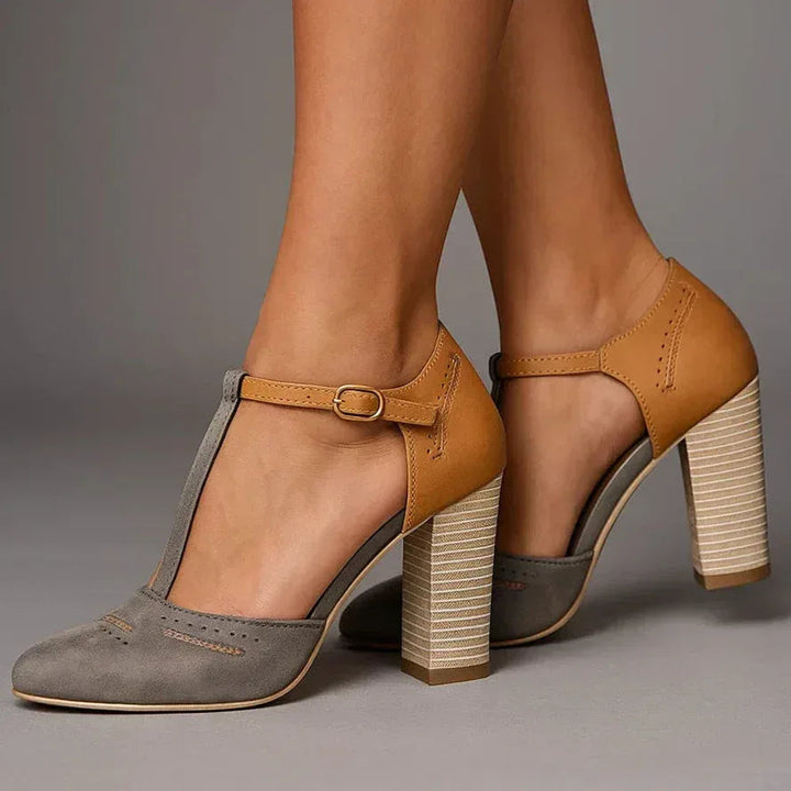Dressy two-tone block heel pumps for women, offering comfortable support and elegant footwear fashion.