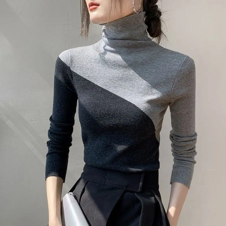 Modern women's casual long-sleeve top, a sophisticated two-tone sweater in gray and khaki for winter fashion.