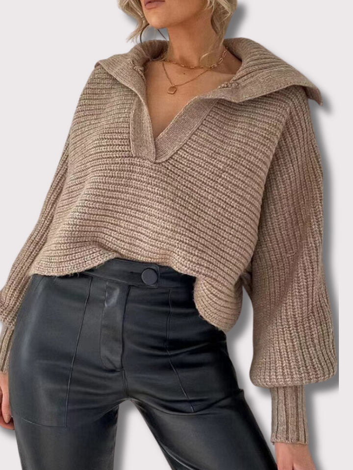 Stylish women's V-neck knitted sweater with a comfortable loose fit, perfect for elegant casual wear.