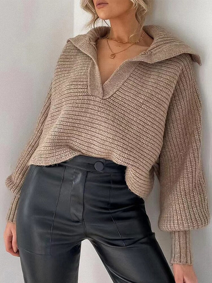 Elegant women's V-neck knitted sweater, stylish loose fit, ideal for fall and winter versatile outfits.