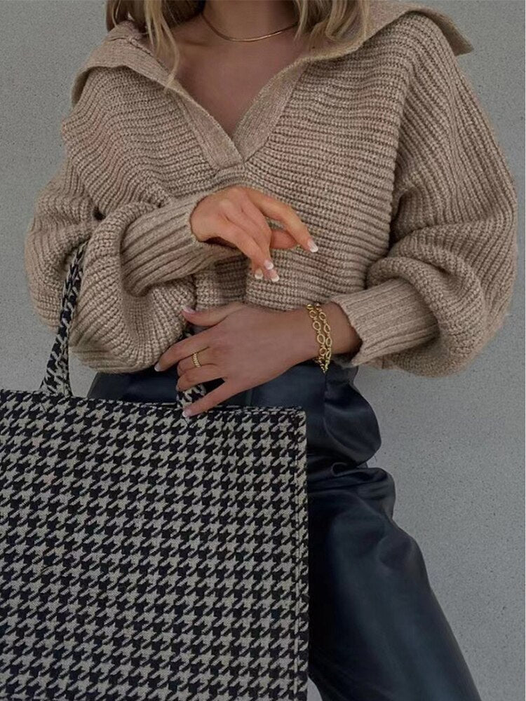 Stylish women's V-neck sweater, knitted, loose fit design ensures comfort for all-day wear.