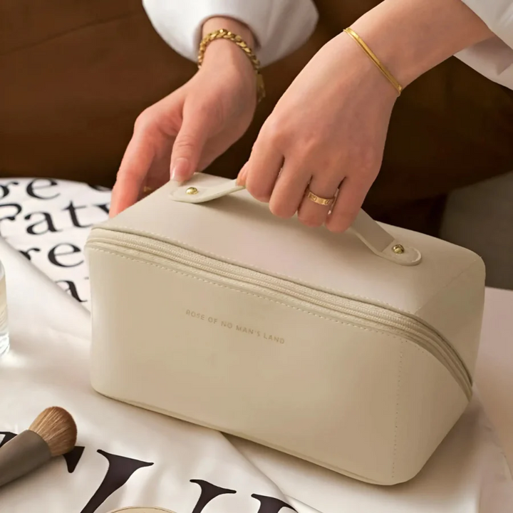 Spacious women's waterproof travel bag, a durable organizer for beauty essentials and cosmetic storage.